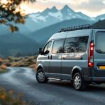 A photograph of a well-maintained used automatic van parked in a scenic outdoor setting